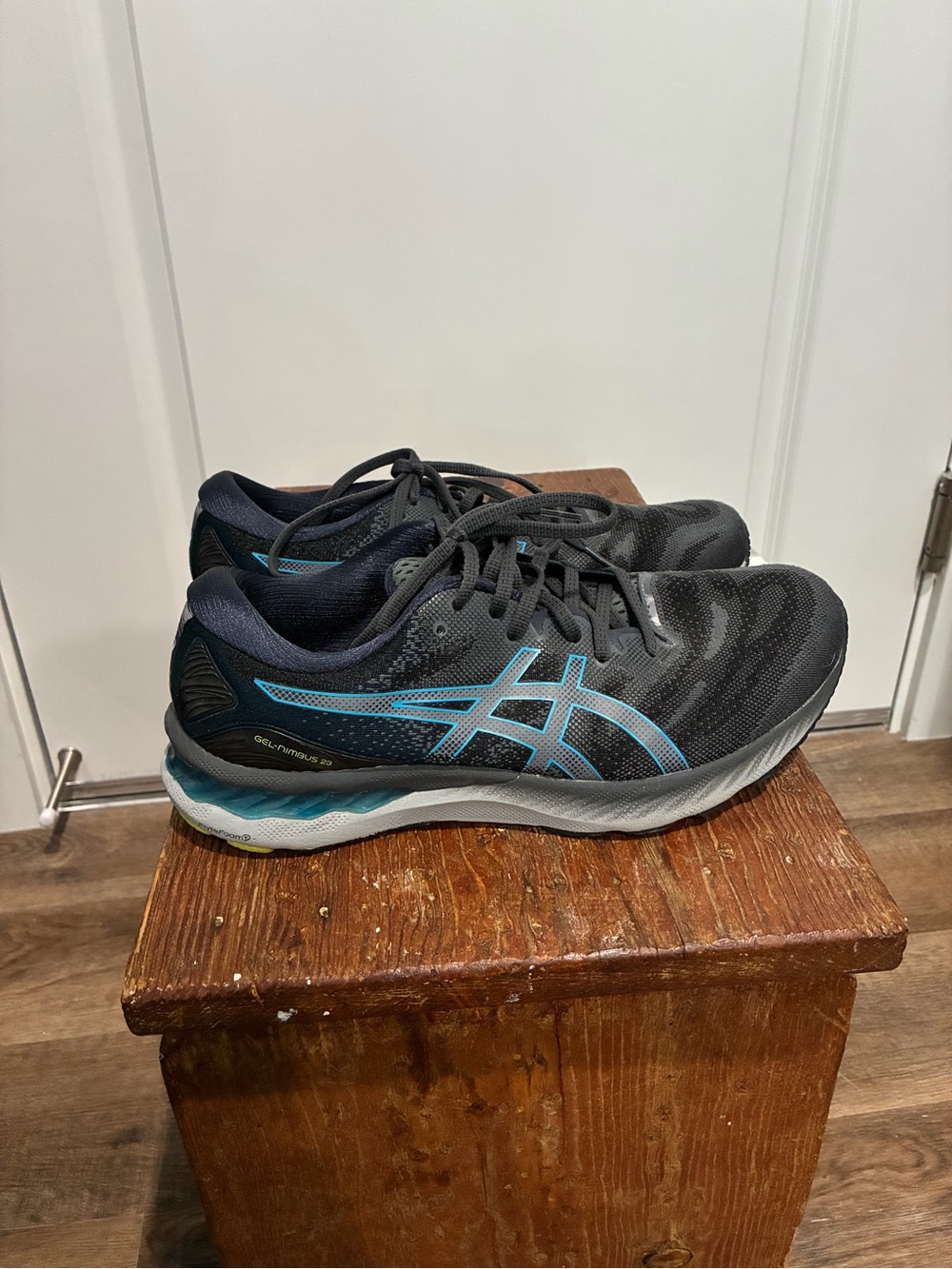 Asics Men's Black Athletic Shoes with Teal Accents